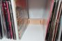 Wooden vinyl record backstoppers keeping LP records aligned in an Ikea Kallax Expedit shelving unit