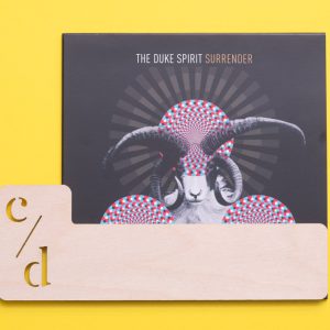Wooden 7-inch record dividers separating vinyl singles and EPs, laser-engraved birch plywood set