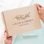 Customer review showing personalised wooden wedding guest book delivered by CluckingBelle Designs UK