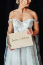 Spiral-bound wedding guest books with personalised engraved plywood covers