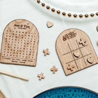 Personalised wooden wedding table games — word search and noughts and crosses designs for wedding reception guests