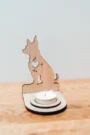 close-up of laser-engraved pet silhouette on memorial candle holder