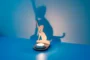 oak pet remembrance candle holder with tealight in lifestyle setting