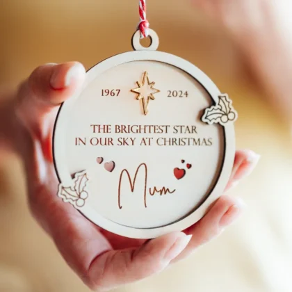 pet memorial personalised Christmas bauble hanging on a Christmas tree