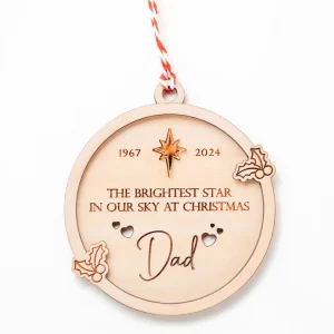 close-up of pet memorial engraved wooden Christmas bauble showing personalised detail