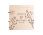 Pair of wildflower engraved wedding guest books showing A4 large and A5 small size comparison