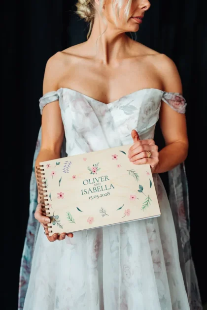 personalised engraved wedding guest book cover detail with laser-engraved floral design