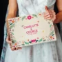 personalised floral engraved wedding guest book cover detail with laser-engraved floral design