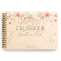 personalised wooden wedding guest book lying flat showing landscape format and copper spiral wire binding