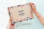 floral engraved personalised wooden wedding guest book with spiral wire binding and personalised wooden cover