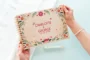floral engraved personalised wooden wedding guest book with spiral wire binding and personalised wooden cover