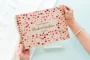 personalised confetti hearts wedding guest book cover detail with laser-engraved floral design