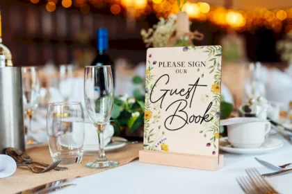 personalised wooden wedding guest book showing interior pages with lines for guest signatures and messages