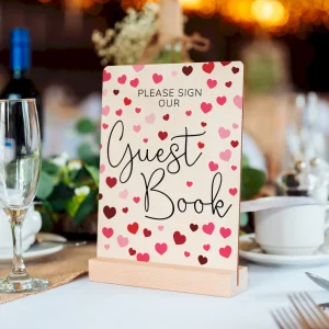This Heart Confetti Wedding Guest Book Sign adds romantic charm to any reception table. Elegant, stylish & ready to display! 💕