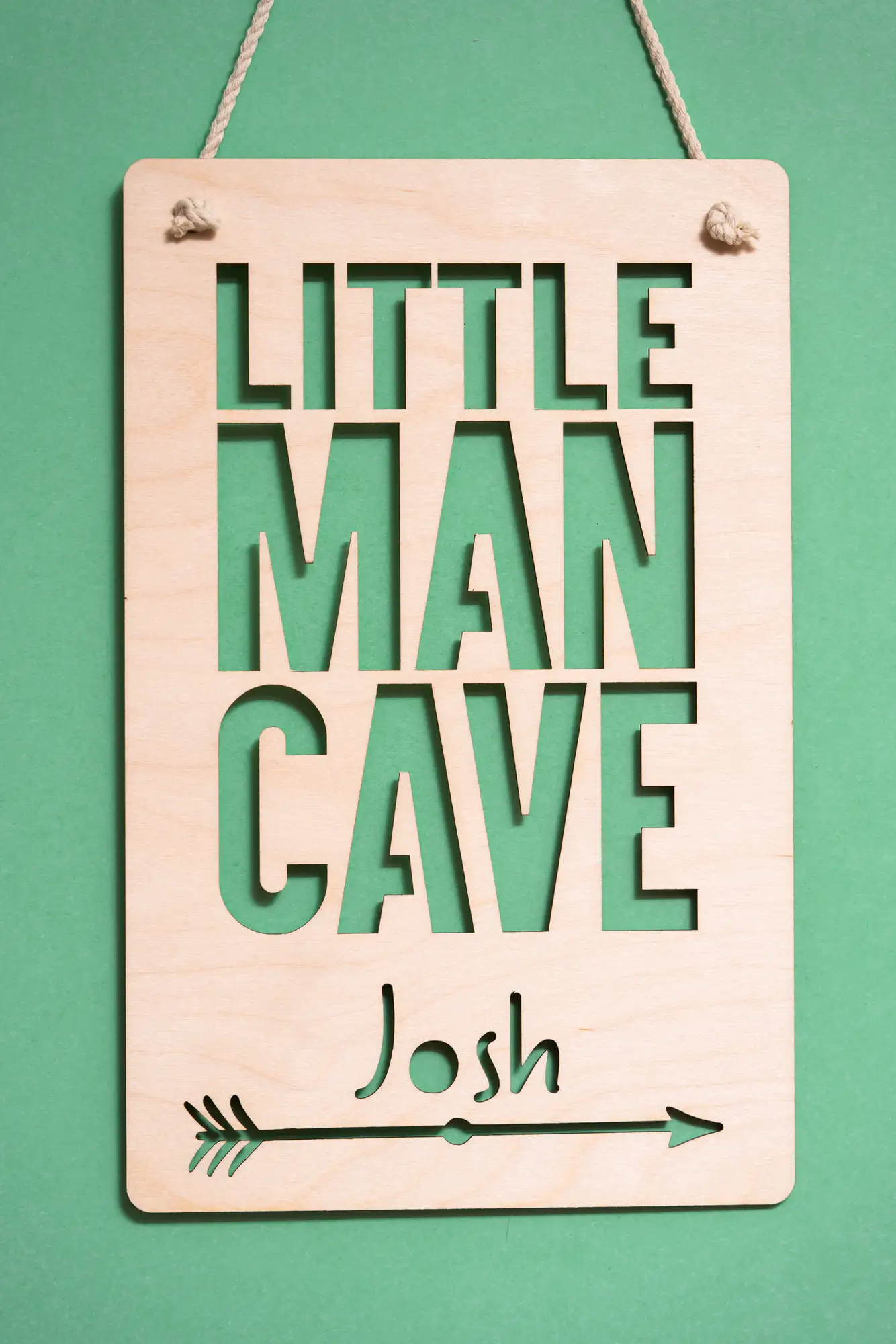 Close-up detail of little man cave sign