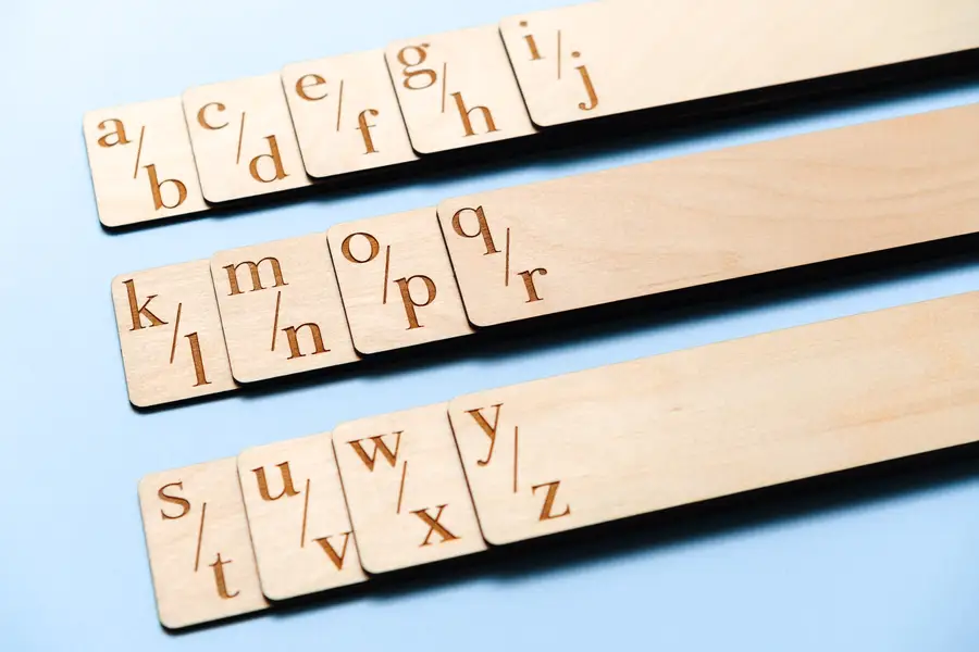Double Sided Engraved Record Dividers standing upright in a record storage unit