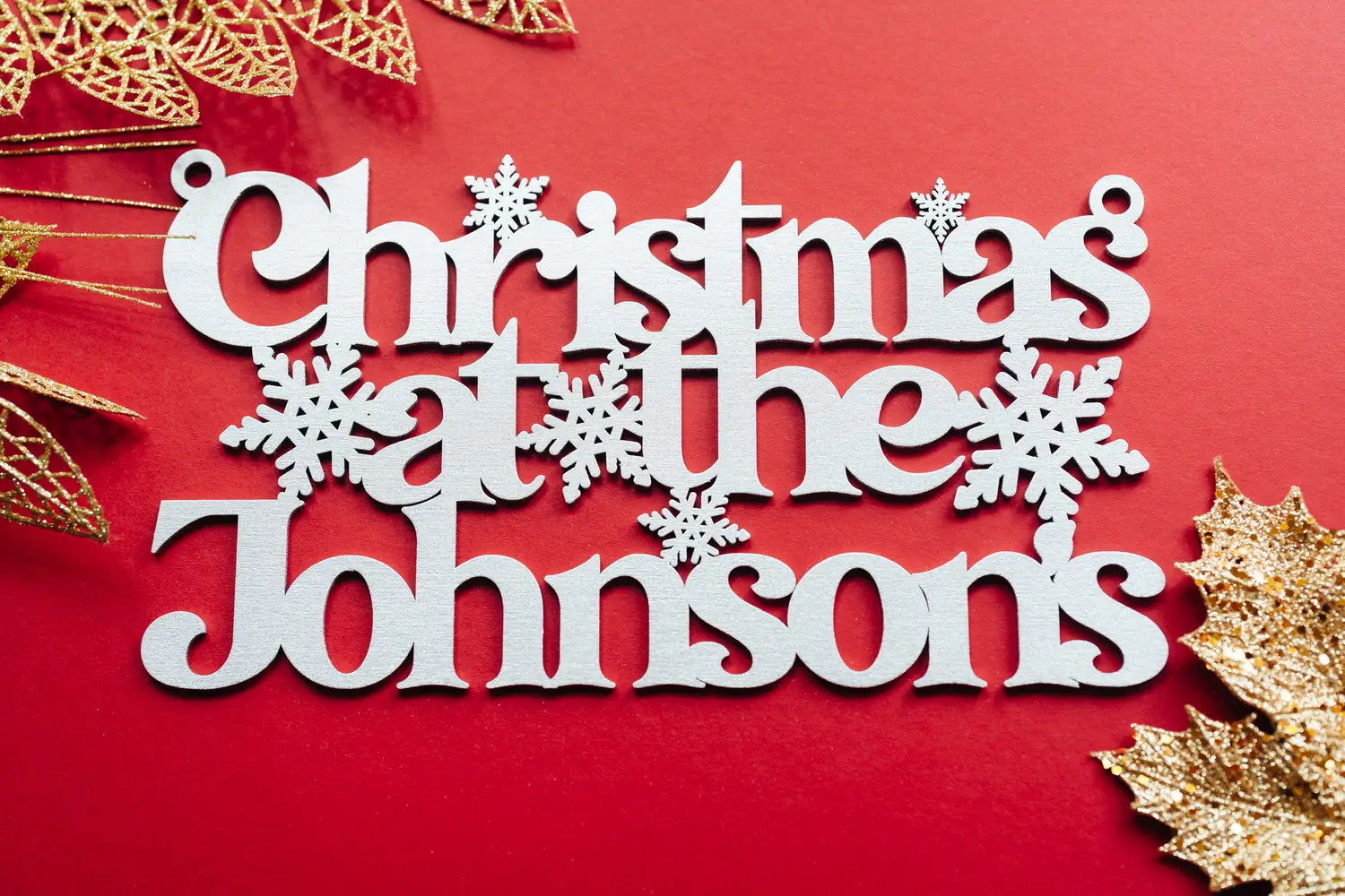 Christmas Family House Sign styled with Christmas decorations