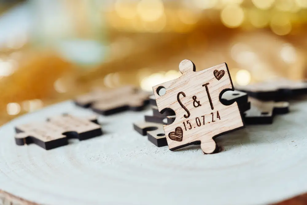 Puzzle Piece Wedding Favours arranged on a wedding table