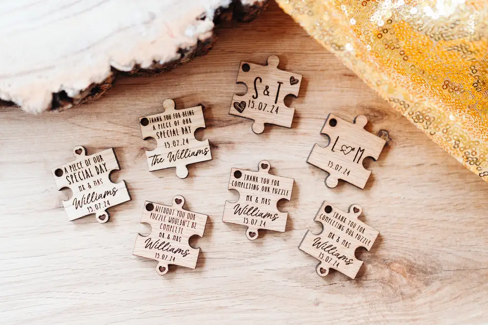 Personalised oak puzzle piece wedding favours with guest names