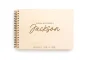 Close-up of the clean & timeless wedding guest book engraved cover detail