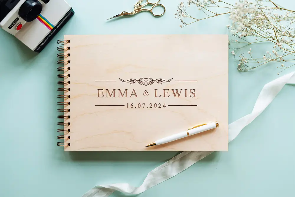 Laser-engraved wooden cover of the clean & modern wedding guest book
