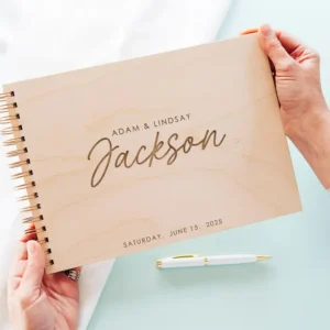Five-star review customer photo of personalised wooden wedding guest book from CluckingBelle Designs