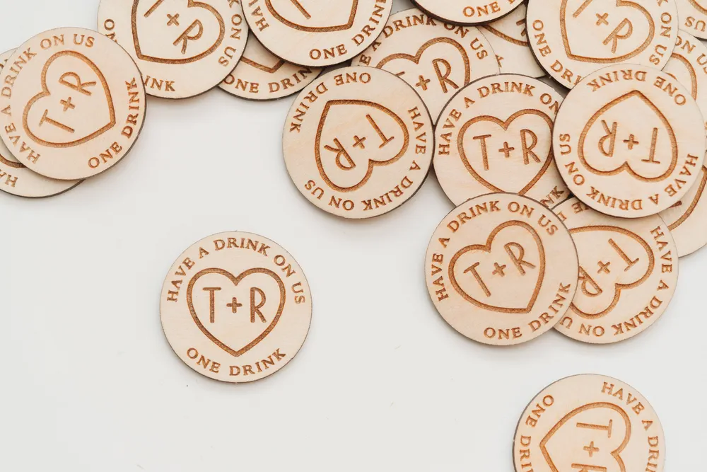 Set of timeless love heart drink tokens for wedding guests