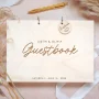 Wooden wedding guest book with engraved monogram design handcrafted by CluckingBelle Designs Norwich