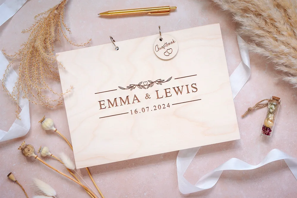 Close-up of the clean & contemporary guest book engraved cover detail
