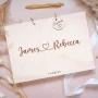 Personalised wooden wedding guest book with engraved couple name design on birch plywood cover