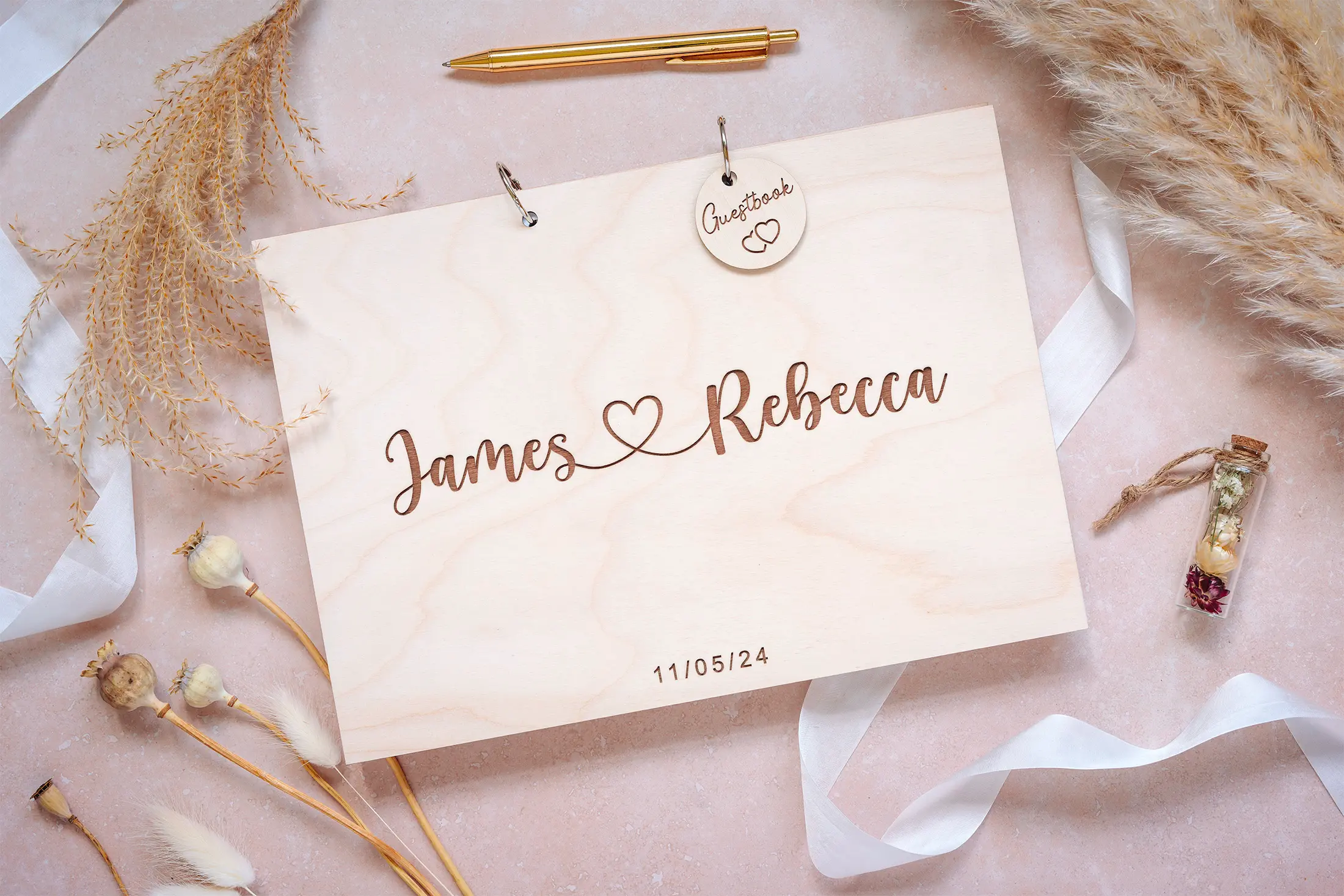 Personalised love heart wedding guest book with couple's names and date