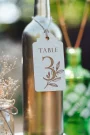 Flower Design Bottle Table Numbers 4 Close-up detail of the flower design bottle table numbers engraving