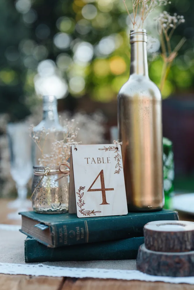 Close-up detail of the wildflower freestanding table numbers engraving