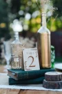 Wildflower Freestanding Table Numbers displayed on a wedding reception table