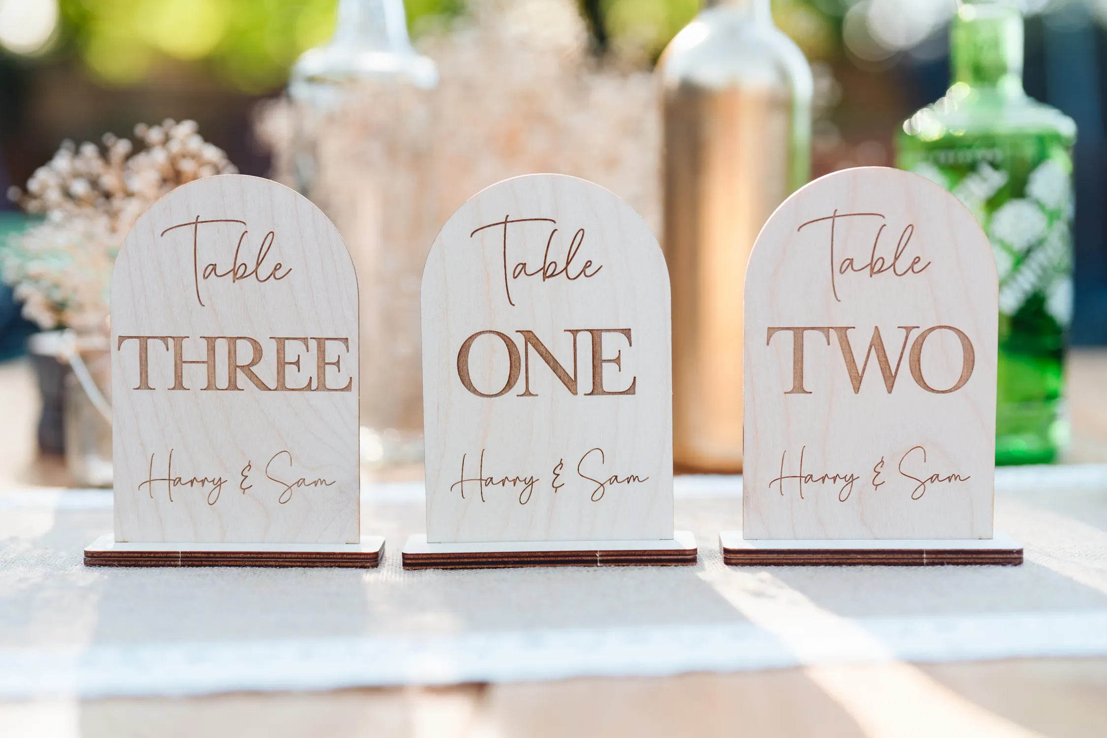Close-up detail of the personalised wedding table numbers engraving