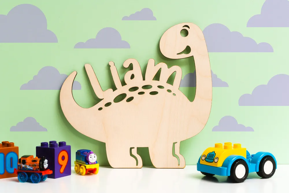 Dinosaur name sign displayed in a child's bedroom