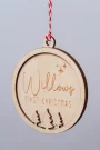 Close-up of the child's first christmas bauble engraved detail
