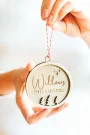 Child's First Christmas Bauble shown with festive decorations