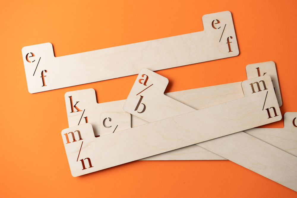A-Z Cut-Out Vinyl Record Dividers separating vinyl records alphabetically