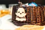Ghost Boo Basket Tag tied to a Halloween treat basket