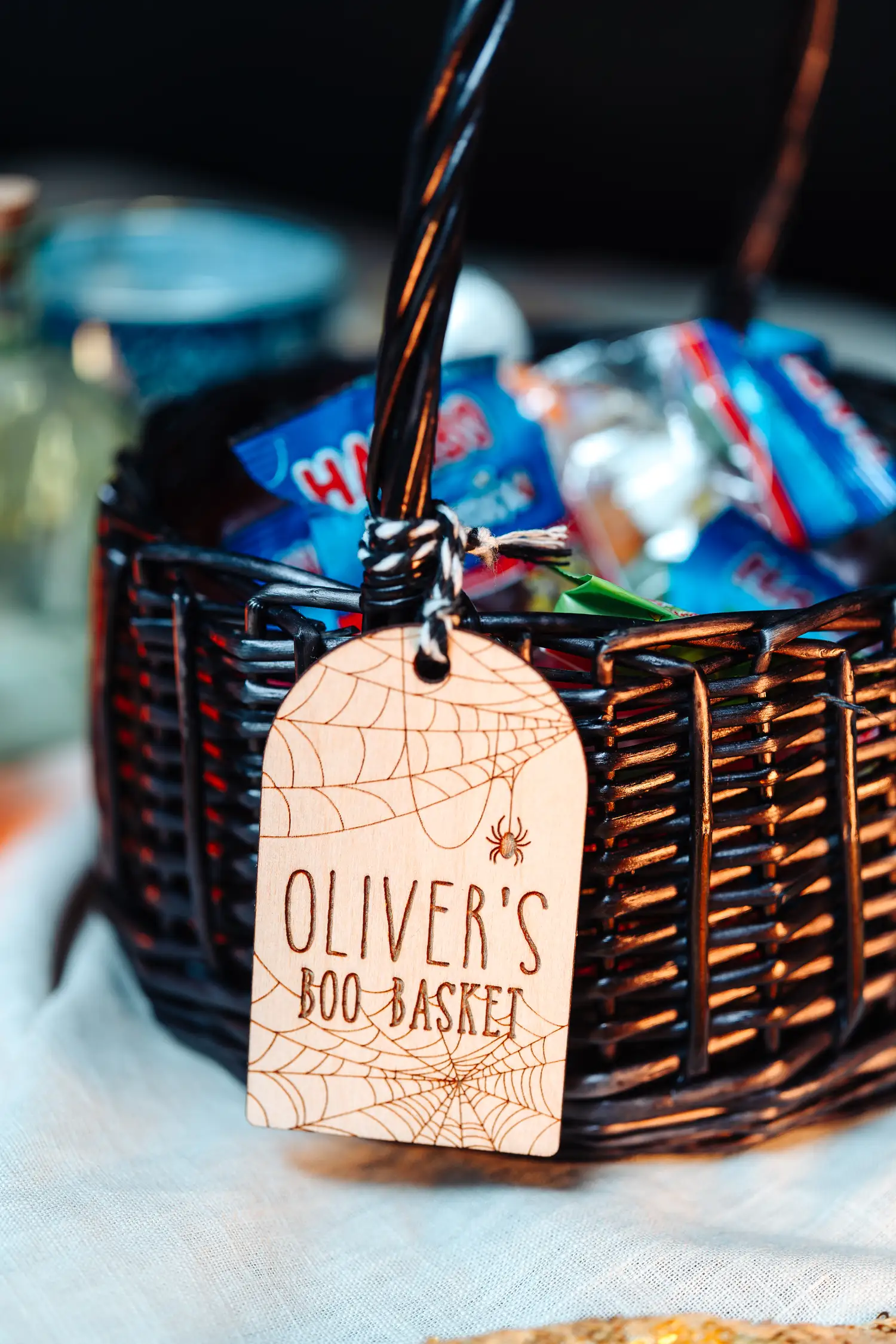 Spider's Web Boo Basket Tag tied to a Halloween treat basket