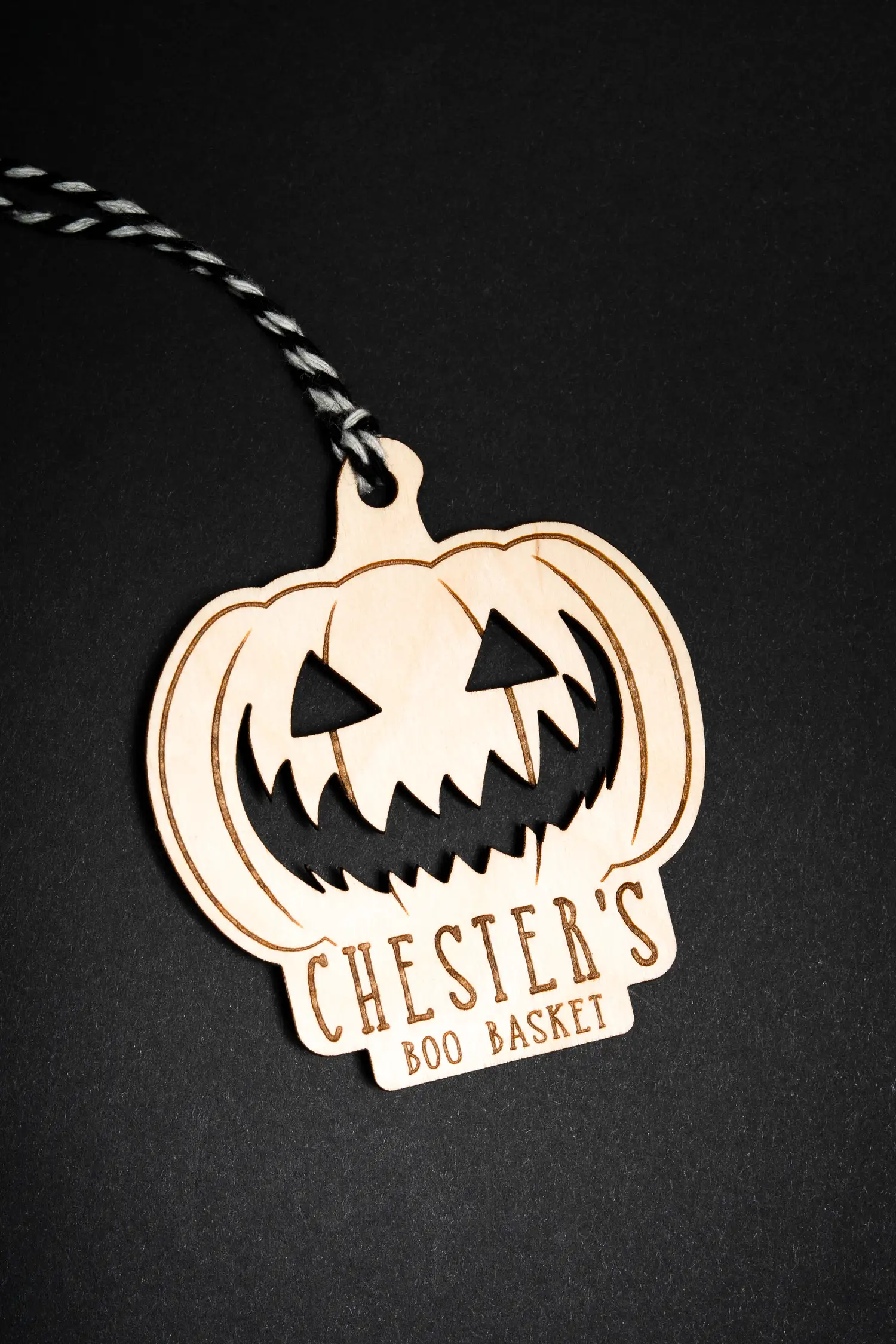 Pumpkin Boo Basket Tag tied to a Halloween treat basket