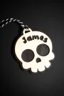 Close-up of the skull boo basket tag engraving
