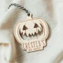 Close-up of the pumpkin boo basket tag engraving