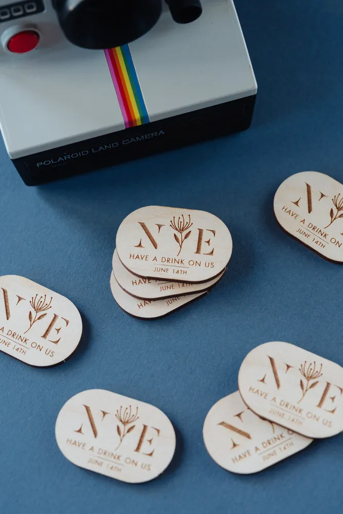 Set of contemporary floral drink tokens for wedding guests