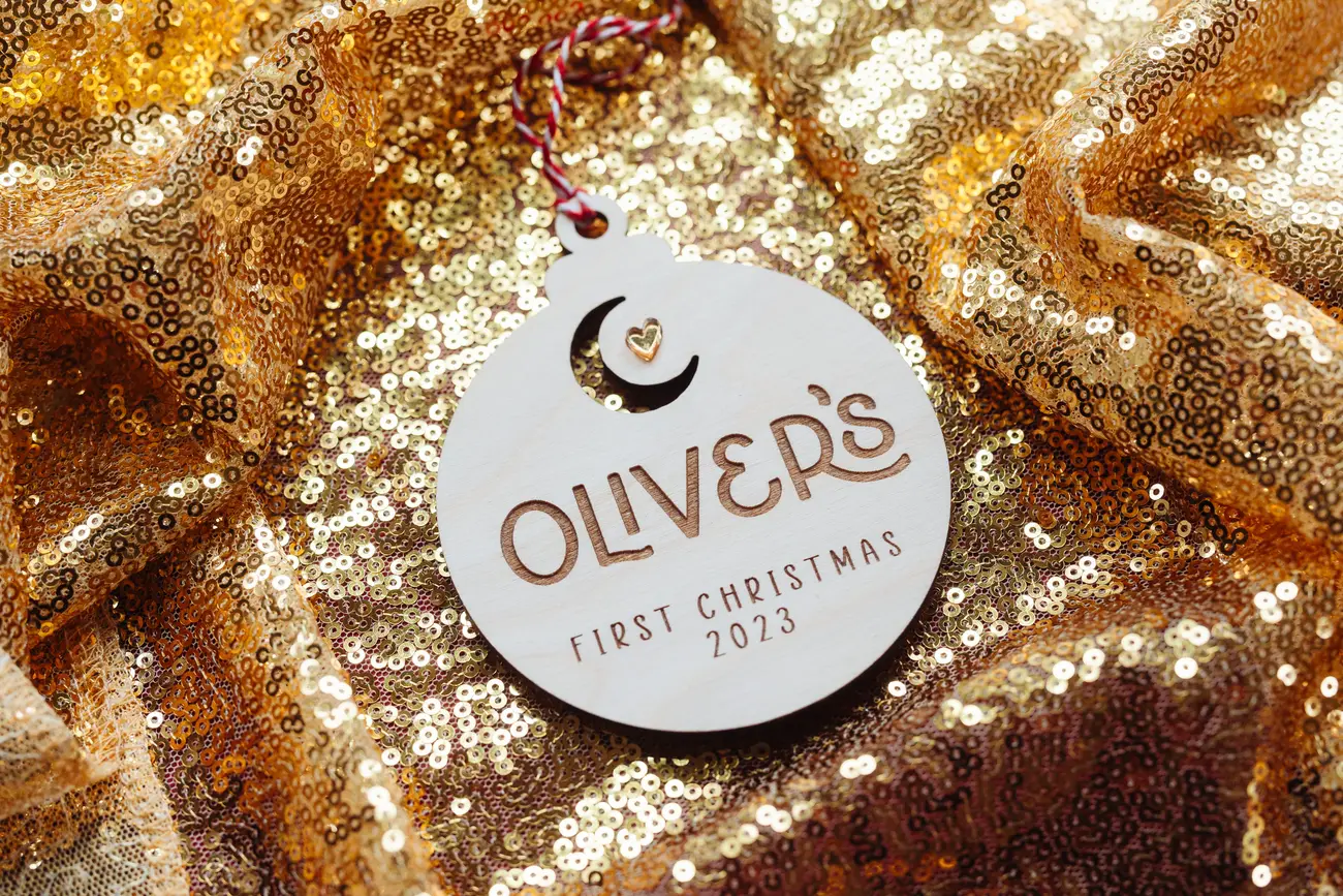 Personalised baby's first christmas moon & star bauble with custom name and year