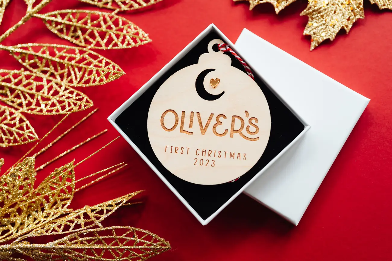 Alternative view of the baby's first christmas moon & star bauble