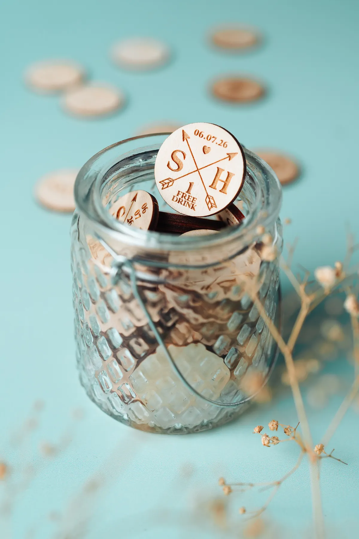 Close-up detail of arrow design drink tokens
