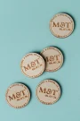 Rustic Charm Drink Tokens displayed on a rustic wooden surface