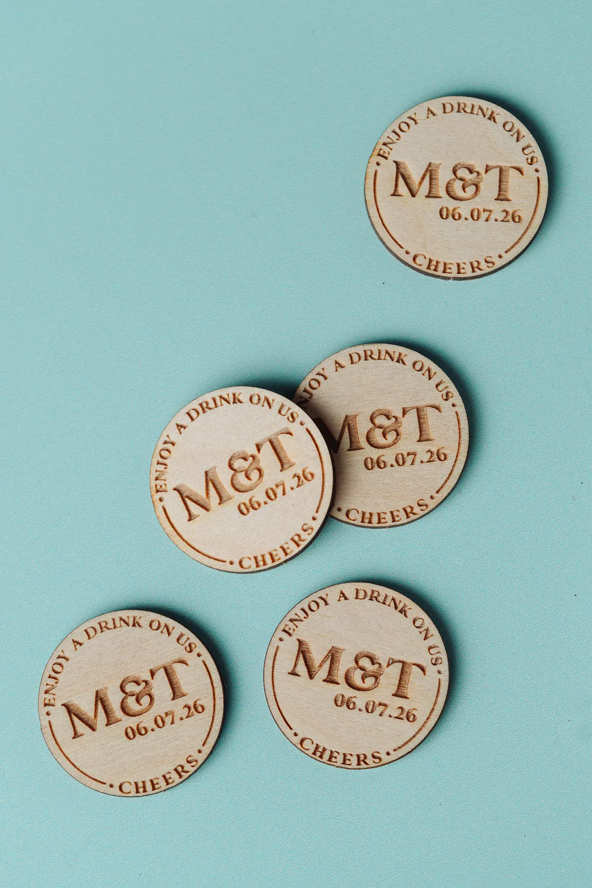 Rustic Charm Drink Tokens displayed on a rustic wooden surface